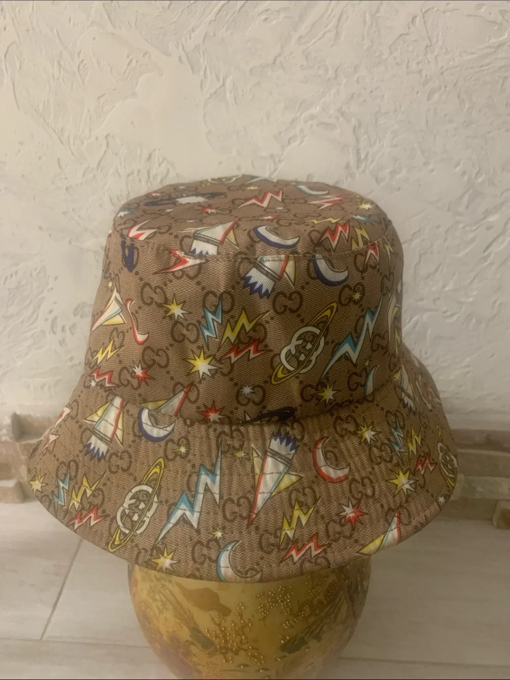Gucci Brown Monogram Bucket Hat with Multicolor Space Motifs